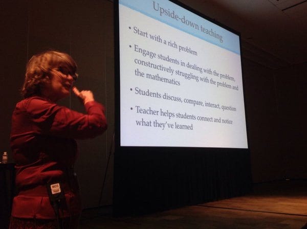 cathy seely speaking at NCTM in front of a powerpoint presentation slide | upside-down teaching: • start with a rich problem • engage students in dealing with the problem, constructively struggling with the problem and the mathematics • students discuss, compair, interact, question • teacher helps students connect and notice what they've learned