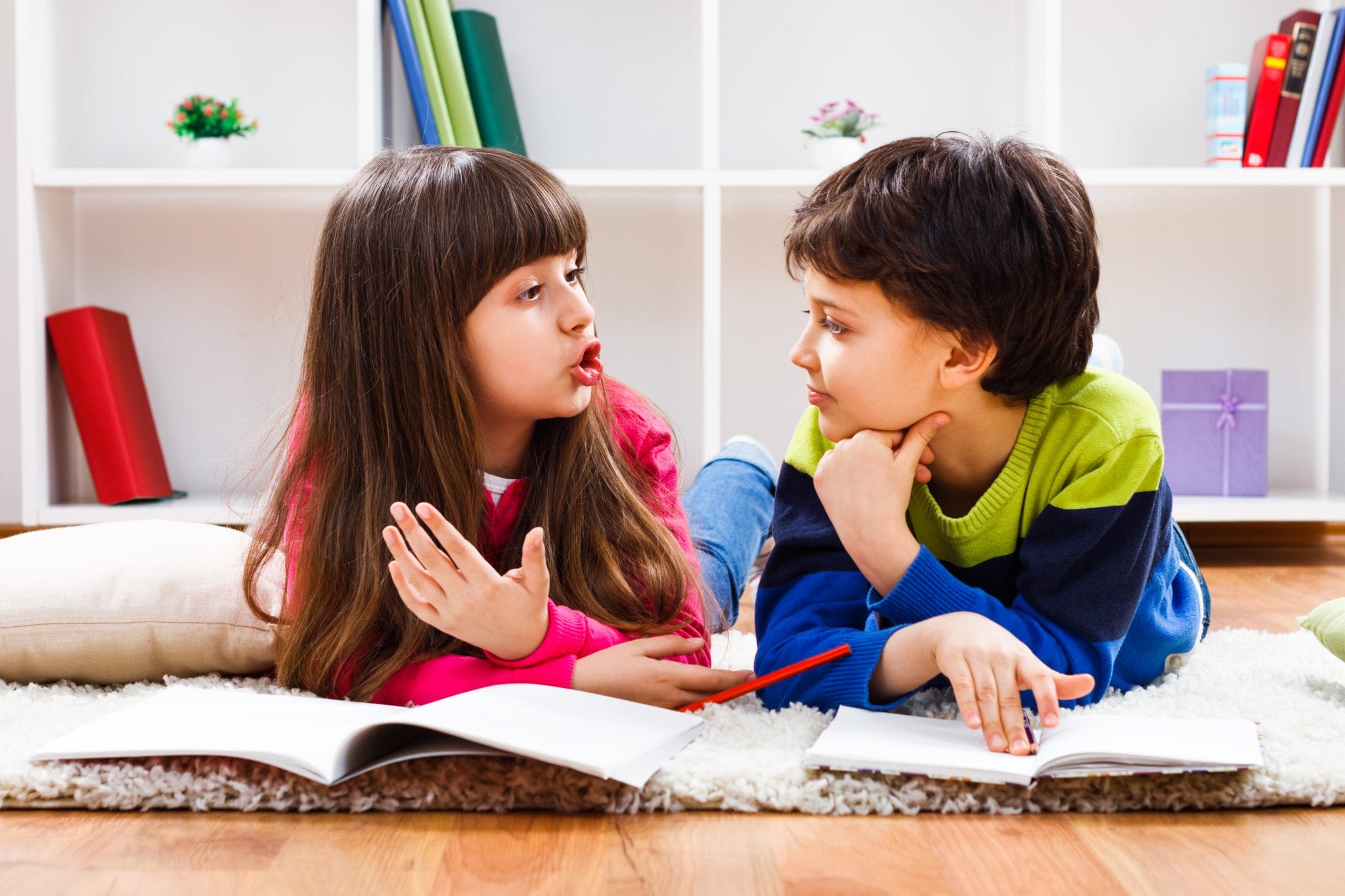 elementary students talking in class